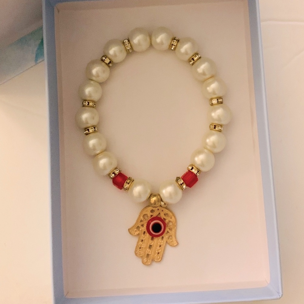Evil eye elastic bracelet with pearls and accents